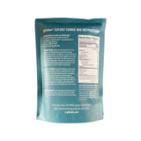 Back of a blue cookie mix package with text and nutrition label on a white background