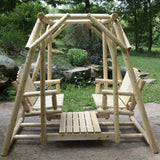 Wooden swing set in a garden setting with greenery and rocks.