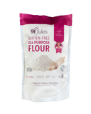 A 24 oz stand-up pouch of 9F Jules Gluten Free All-Purpose Flour, featuring a white bag with magenta accents, a graphic of flour and a rolling pin, and a 'Women Owned' badge.
