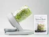 Sprout maker with a book titled 'The Sprout Book' by Doug Evans on a light gray background