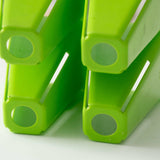 Close-up of green plastic 4 Cell Plug Tray Inserts