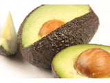 Close-up of a halved Hass [California] Avocado with a white background