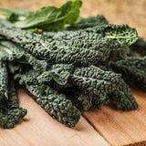  Toscano Kale / Tuscan Kale / Italian Kale / Dinosaur Kale / Cavolo Nero / Black Leaf ) on a wooden surface