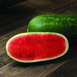 Organic Heirloom Jubilee Watermelon on a wooden surface
