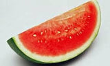 Slice of Heirloom Organic Klondike Blue Ribbon Striped Watermelon on a white background