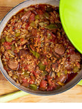 Jambalaya Kit Grow Your Own Organic Food with vegetables and meat in a pan on a wooden surface