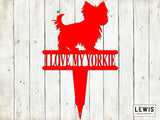 Red silhouette of a dog with 'I love my Yorkie' text on a wooden background, featuring the Lewis Design Company logo.