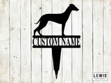 Black silhouette of a whippet dog with 'CUSTOM NAME' text on a wooden background, featuring the Lewis Design Company logo.