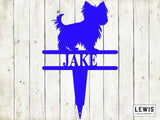 Blue silhouette of a dog on a nameplate with 'JAKE' on a wooden background, featuring the Lewis Design Company logo.