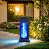 Solar lamp with blue light emitting area in a garden setting