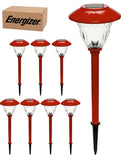 Set of red solar-powered garden lights with Energizer box in the background