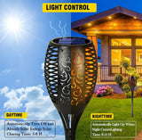 Solar-powered outdoor light with day and night functionality in front of a house.