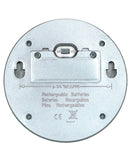 Bottom view of a Living Accents  Black  Deck Solar Lights Powered  LED  Utility Light 4 Pack with battery compartment labels on a white background