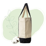 Beige and black tote bag with cotton plant on a white background