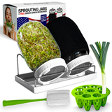 Sprouting jars with packaging, green onion, and accessories on a white background