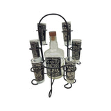 Tequila bottle with shot glasses in a holder on a white background
