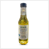 Bottle of castor oil with a label on a white background