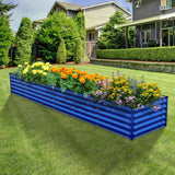 Blue metal raised garden bed with flowers in a backyard setting