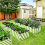 Green metal Olle Gardens 17" Tall Rectangle Infinity Raised Garden Beds with plants and flowers in a backyard setting.