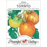 Peaceful Valley Valencia Tomato seed packet with illustrations of tomatoes and leaves.