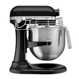 Black and silver stand mixer on a white background