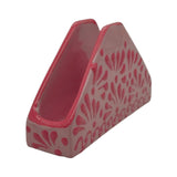 Pink and gray triangular holder with floral pattern on a white background