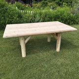 Rustic Outdoor Wooden Patio Table on grass with garden background