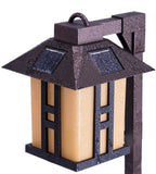 Solar-powered outdoor lantern with two solar panels on a white background