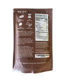 Back of a brown food packaging with text, nutrition facts, and barcode on a white background