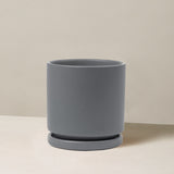 Gray planter on a beige background
