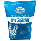 A 16 oz bag of Wheat Montana Farms & Bakery Natural White Premium All-Purpose Flour, featuring a blue and white packaging design with wheat illustrations.